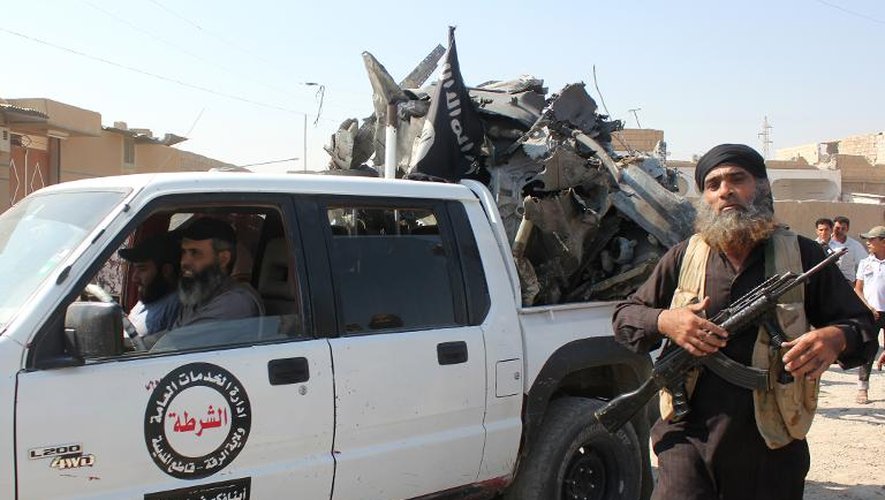 Des combattants du groupe "Etat Islamique" à Raqa, en Syrie, le 16 septembre 2014