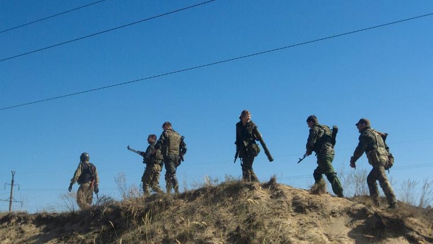 Des soldats ukrainiens dans la région de Lugansk à l'est de l'Ukraine le 20 septembre 2014