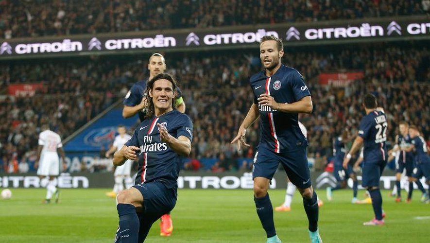 L'attaquant du PSG Edinson Cavani fête son but contre Lyon, le 21 septembre 2014 au Parc des Princes