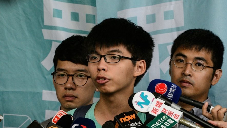 Joshua Wong, Nathan Law et Alex Chow, figures de la "révolte des parapluies", le 15 août 2016 à Hong-Kong