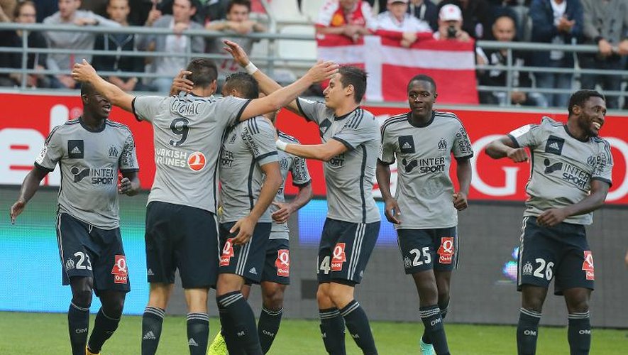 Les joueurs de Marseille fêtent un but marqué par André-Pierre Gignac (N.9) contre le RC Reims, le 23 septembre 2014 au stade Auguste Delaune