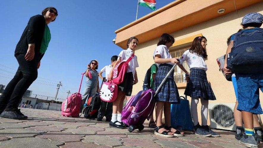 Les élèves arrivent à l'école de la Mission Laïque française "Danielle Mitterrand", le 28 septembre 2014 à Erbil, capitale du Kurdistan irakien