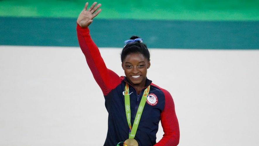 La gymnaste américaine Simone Biles, sacrée championne olympique lors du concours général individuel, le 11 août 2016 aux JO de Rio