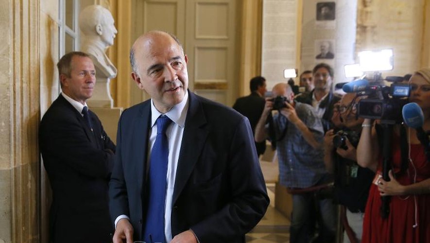 Pierre Moscovici le 16 septembre 2014 dans les couloirs de l'Assemblée nationale à Paris