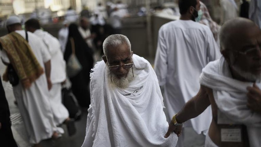 Des musulmans arrivent pour la prière à La Mecque, le 29 septembre 2014