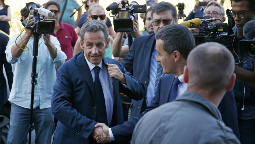 Nicolas Sarkozy arrive à son nouveau QG de campagne à Paris le 23 août 2016