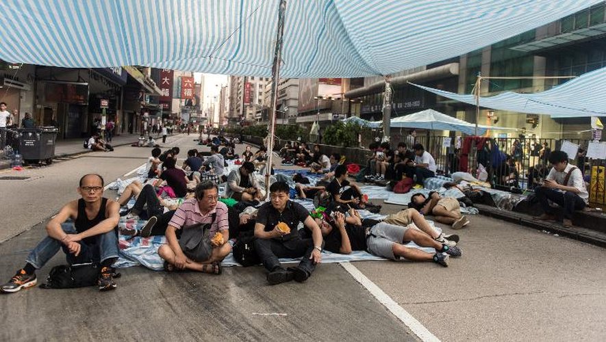 Des manifestants prodémocratie dans le quartier de Mong Kok, le 6 octobre 2014 à Hong Kong