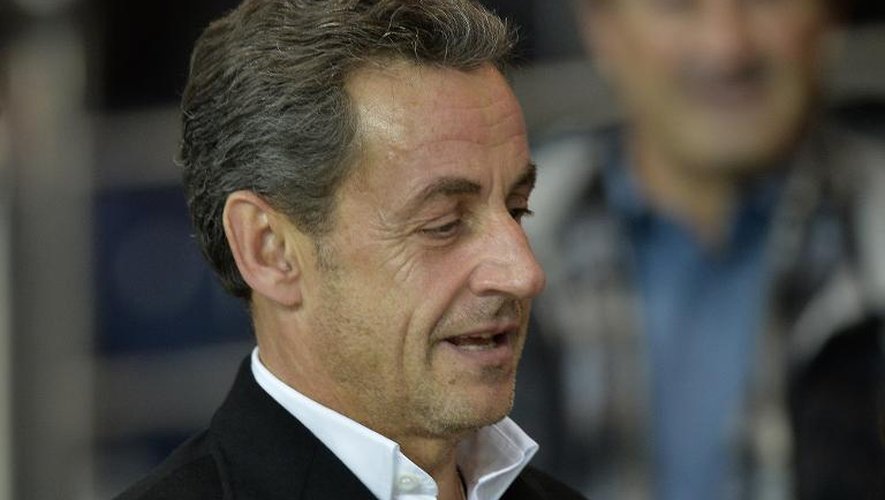 Le candidat à la présidence de l'UMP Nicolas Sarkozy au Parc des Princes, à Paris, lors de la rencontre entre le Paris Saint-Germain et l'AS Monaco, le 5 octobre 2014