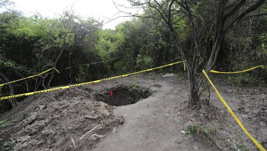 Une fosse à Pueblo Viejo dans la banlieue d'Iguala (Mexique) où ont été retrouvés 28 corps, le 6 octobre 2014