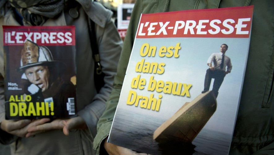 Les salariés de L'Express, L'Expansion et L'Etudiant manifestent contre un plan social révélé par Patrick Drahi, le 2 octobre 2015 à Paris