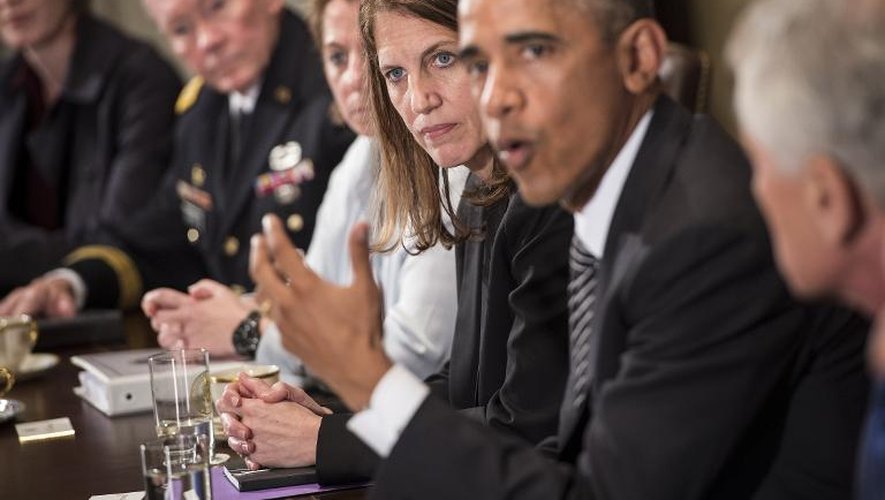 La secrétaire à la Santé Sylvia Burwell et le président Barack Obama lors d'une réunion à la Maison Blanche le 15 octobre 2014 à Washington
