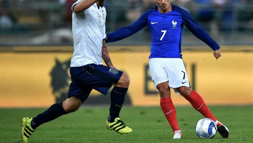 Daniele De Rossi et Antoine Griezmann lors du match amical