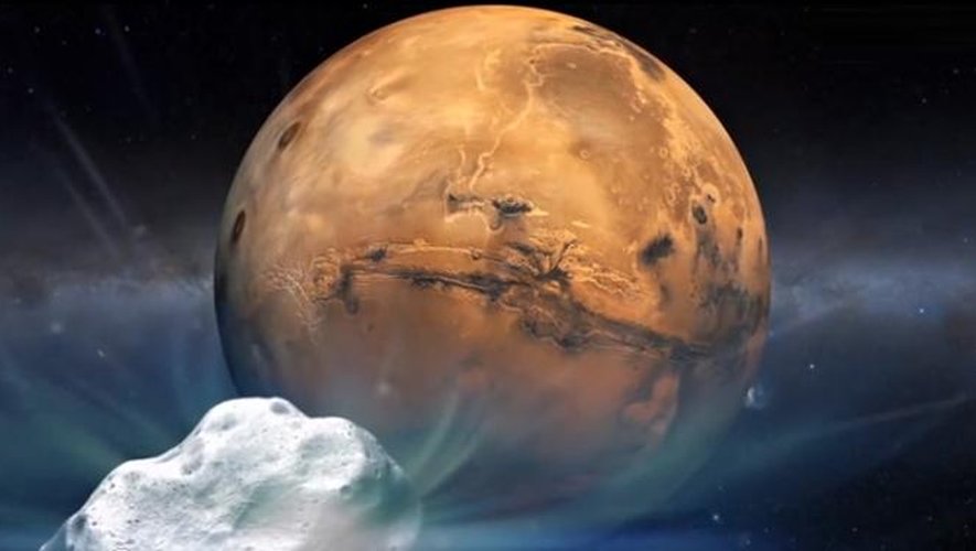 Une peinture artistique représente la comète Siding Spring et la planète Mars