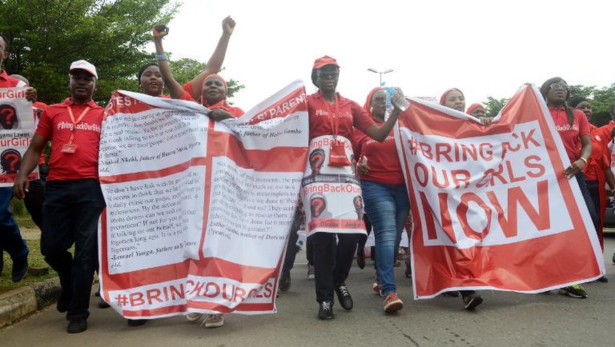 Des militants de la campagne "Rendez-nous nos filles" pour la libération des lycéennes nigérianes kidnappées par Boko Haram manifestent à Abuja le 14 octobre 2014