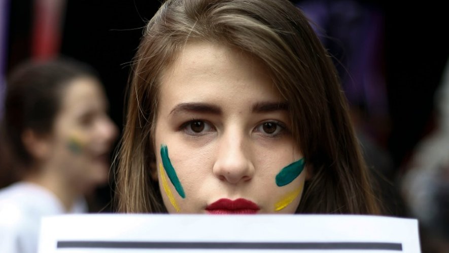 Une manifestante proteste contre le président brésilien Michel Temer à Sao Paulo, le 4 septembre 2016