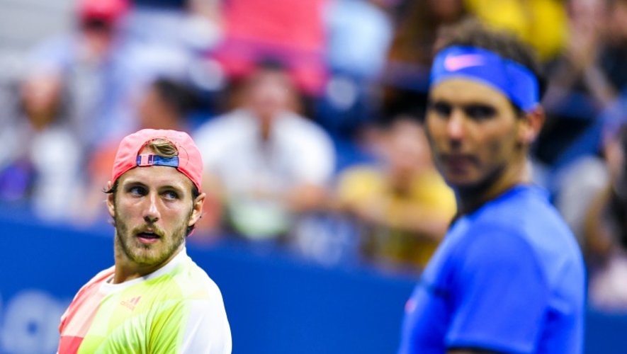 Lucas Pouille (g) face à Rafael Nadal en 8e de finale de l'US Open, le 4 septembre 2016 à New York