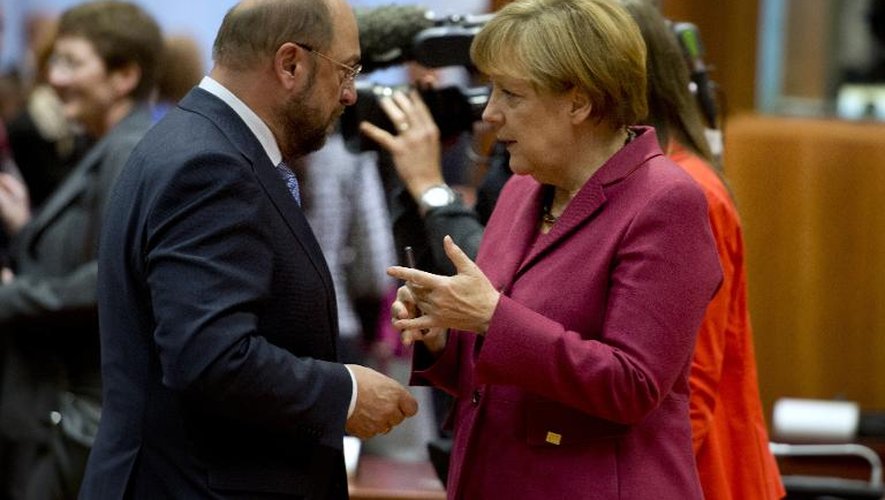 La Chancelière allemande Angela Merkel et le président du Parlement européen, Martin Schulz, lors du sommet sur le climat à Bruxelles, le 23 octobre 2014