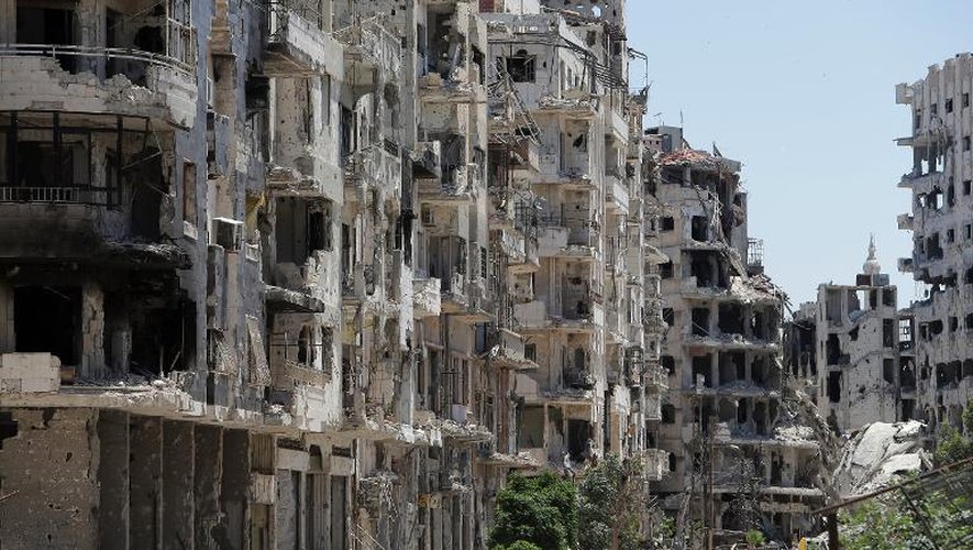 Bâtiments détruits lors de combats entre rebelles et forces gouvernementales le 3 juin 2014 à Homs