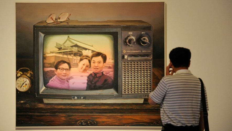 Une oeuvre nommée "C'est mieux de n'avoir qu'un seul enfant" exposée au Musée d'art national chinois à Pékin, le 11 septembre 2012