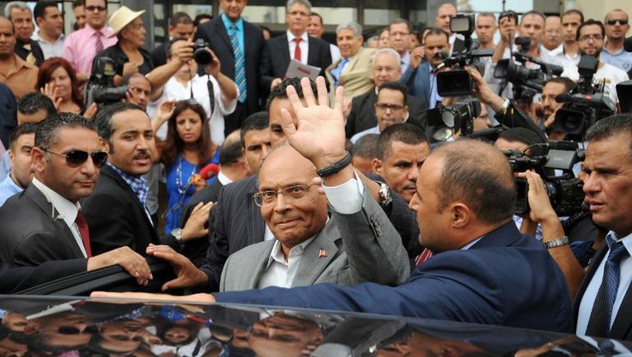 Le président tunisien Moncef Marzouki (c), candidat aux prochaines élections présidentielles, le 20 septembre 2014 à Tunis