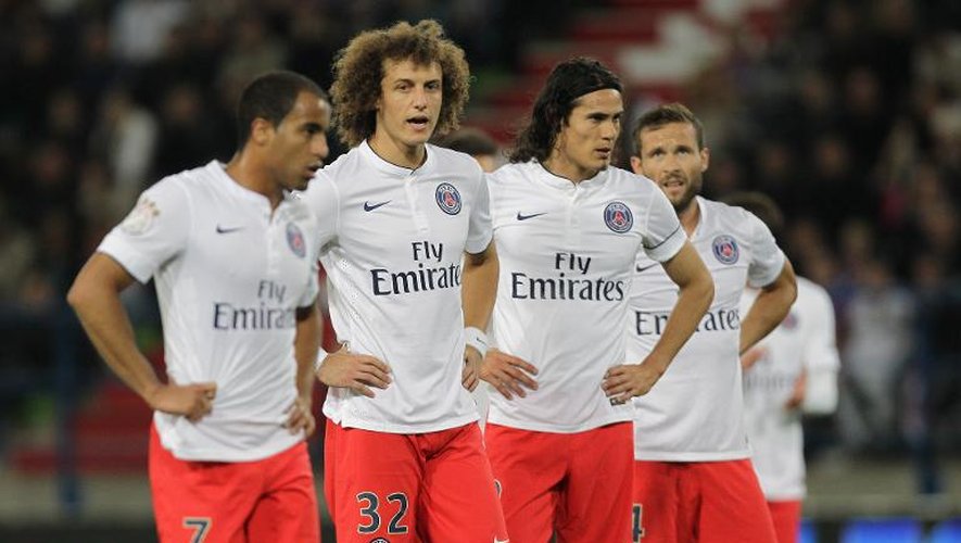 Les joueurs du PSG (g à d) Lucas, David Luiz, Edinson Cavani et Yohan Cabaye, lors d'un match à Caen, le 24 septembre 2014