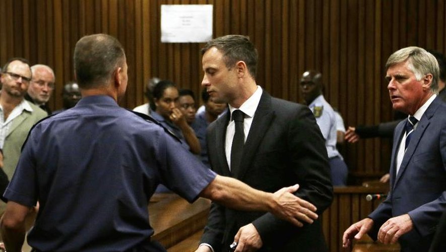 Oscar Pistorius après l'annonce de son verdict au tribunal à Pretoria, le 21 octobre 2014