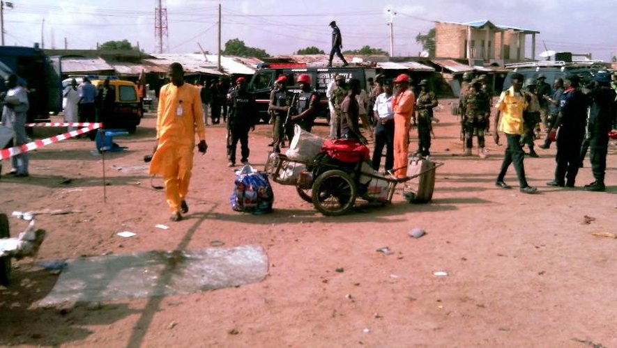 Sur les lieux d'un attentat perpétré à Kano, dans le nord du Nigeria, le 24 juillet 2014