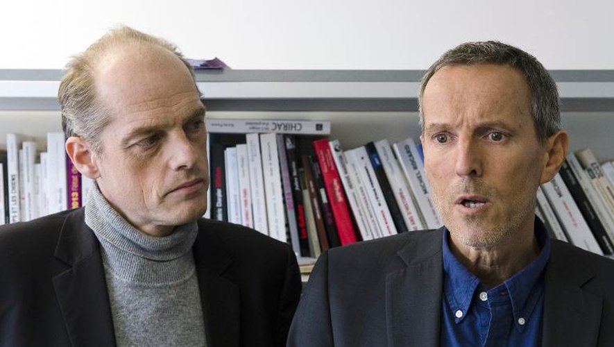 Les deux journalistes du Monde, Fabrice Lhomme (g) et Gerard Davet (d) le 10 novembre 2014 au siège de l'AFP à Paris
