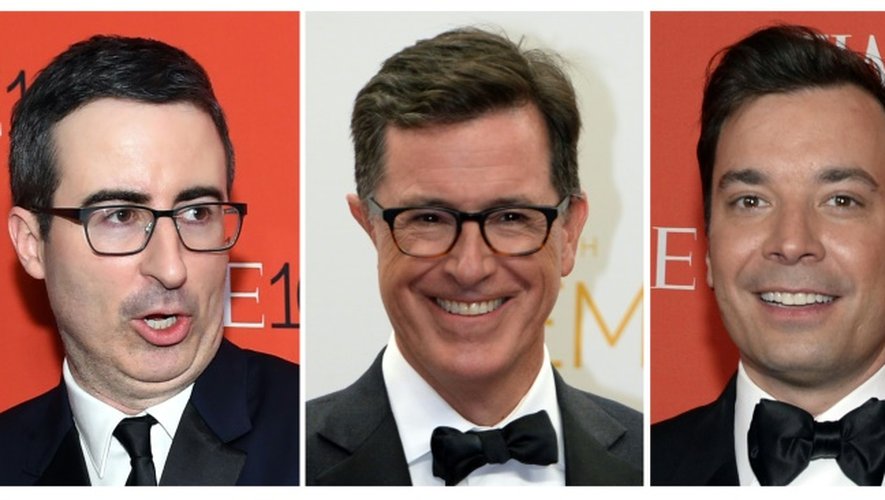 Montage photo montrant John Oliver et Jimmy Fallon (d) à New York le 21 avril 2015, et Stephen Colbert (c) le 25 août 2014 à Los Angeles