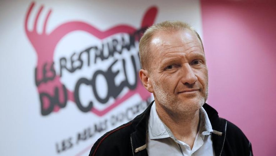Le président des "Restos du Coeur" Olivier Berthe lors du lancement de la 29e campagne le 25 novembre 2013 à Paris