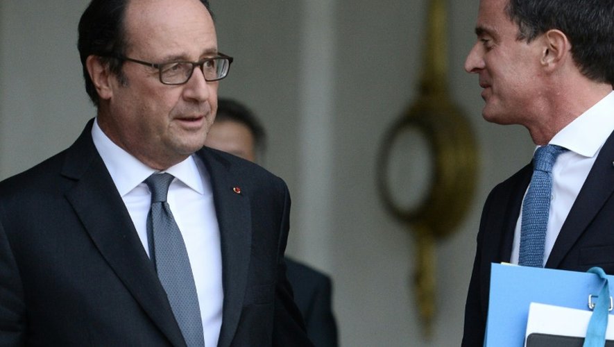 Le président François Hollande et le Premier ministre Manuel Valls à l'issue du conseil des ministres le 28 septembre 2016 à l'Elysée à Paris