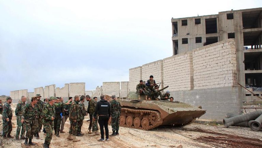 Photo fournie le 19 octobre 2014 par l'agence syrienne Sana des forces armées syriennes près d'Alep