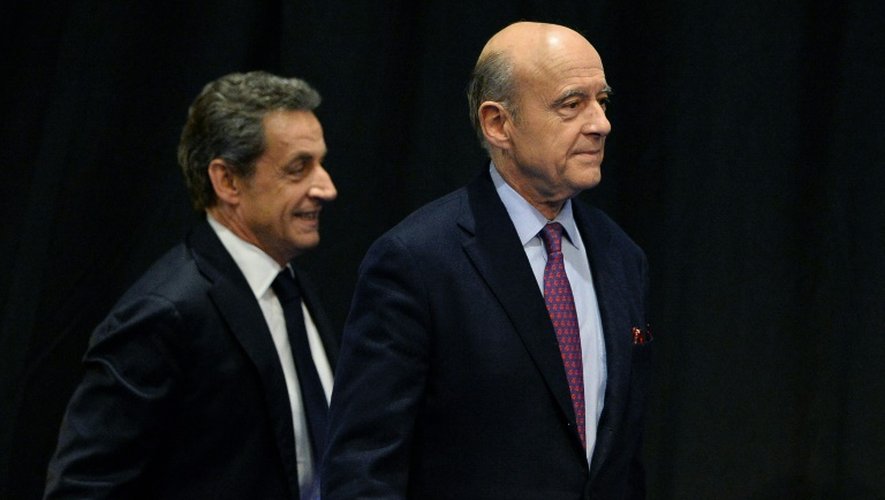 Nicolas Sarkozy (g) et Alain Juppé, le 14 octobre 2015 à Limoges