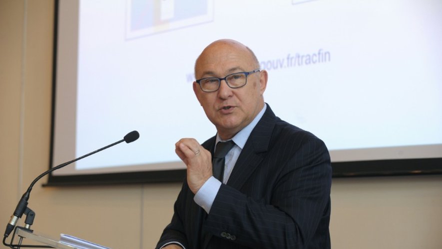Le ministre des Finances Michel Sapin lors de la remise d'un rapport de Tracfin à Paris, le 11 juillet 2014