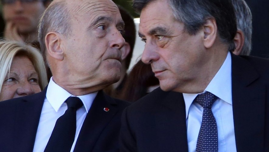 Alain Juppé et François Fillon (D), le 15 octobre 2016 à Nice, lors de l'hommage national aux victimes de l'attentat du 14 juillet