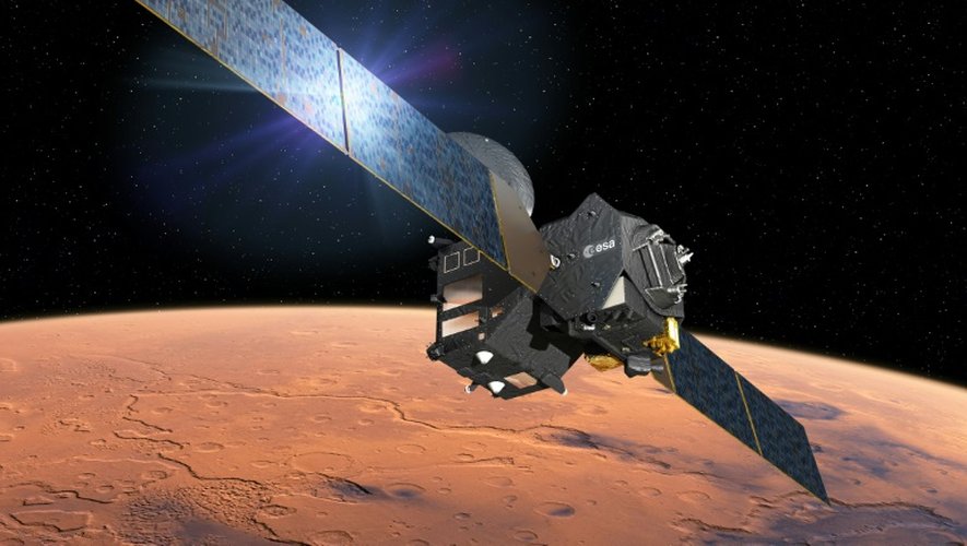 Illustration d'artiste diffusée sur le site web de l'Agence spatiale européenne, le 1er mars 2016, montrant le module d'entrée, de descente et d'atterrissage Schiaparelli de la sonde TGO en route pour Mars