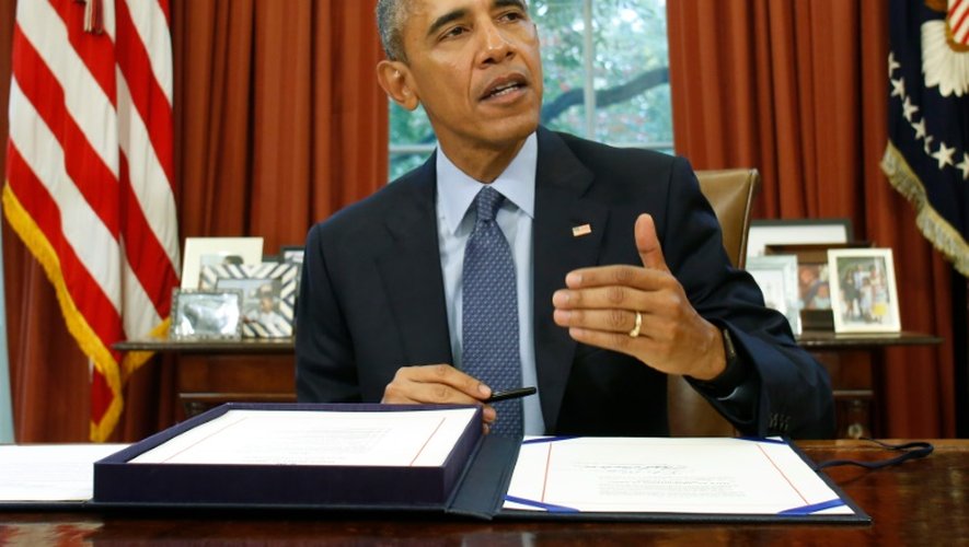 Le président américain Barack Obama dans le Bureau ovale à la Maison Blanche à Washington DC, le 2 novembre 2015