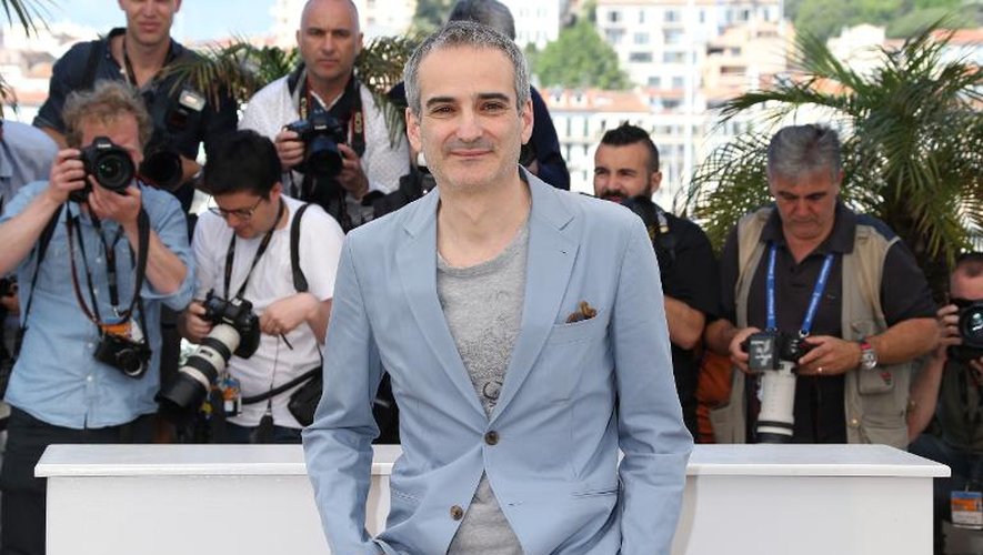 Le réalisateur Olivier Assayas, pose lors du 67e festival de Cannes, le 23 mai 2014