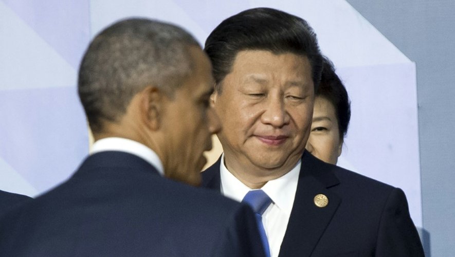 Le président américain Barack Obama (à gauche) et le président chinois Xi Jinping à Manille le 19 novembre 2015