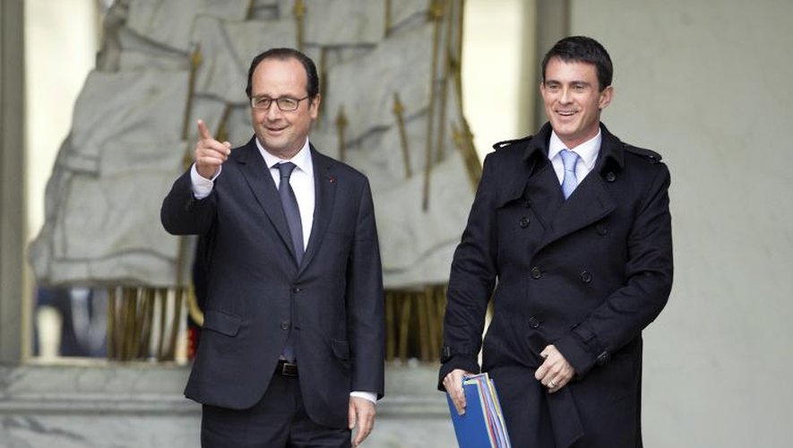 François Hollande et Manuel Valls à l'issue du Conseil des ministres le 26 novembre 2014 à l'Elysée à Paris