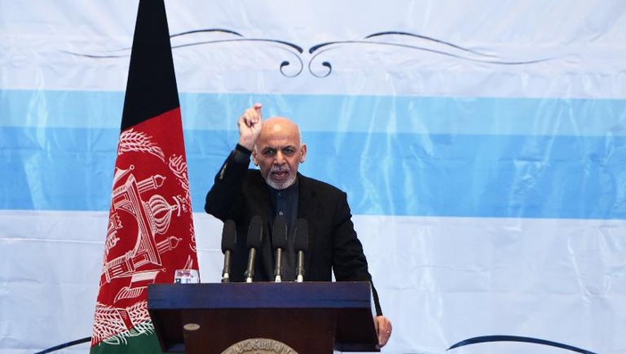 Le président afghan Ashraf Ghani prononce un discours dans un lycée de Kaboul le 14 décembre 2014