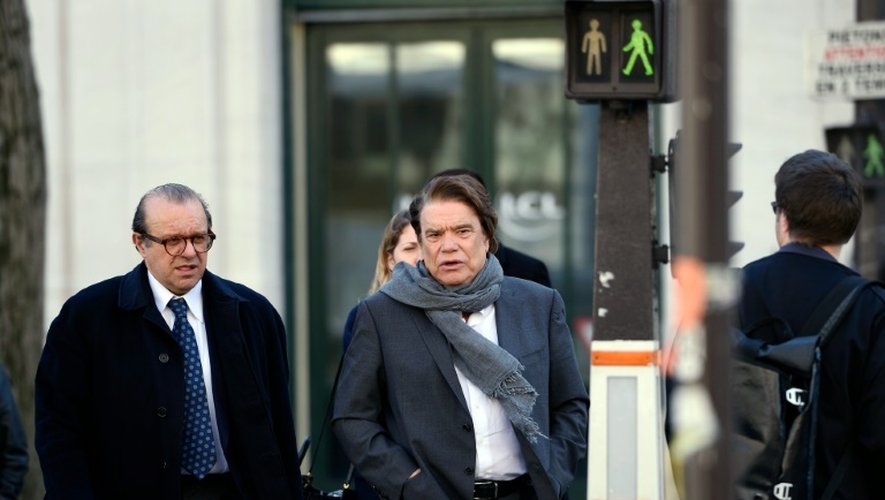 Bernard Tapie (C) et son avocat Hervé Temime le 12 mars 2015 à Paris