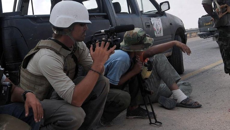 Le journaliste américain James Foley, assassiné le 19 août 2014 par le groupe EI en Syrie, ici près de la ville libyenne de Sirte le 29 septembre 2011