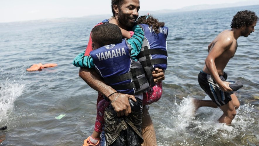 Arrivée de migrants en provenance de Turquie le 14 août 2015 sur l'île grecque de Lesbos