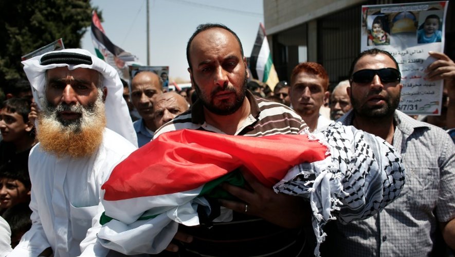 Funérailles d'Ali Saad Dawabsha, le bébé palestien mort brûlé vif avec ses parents, le 31 juillet 2015 à Douma en Cisjordanie occupée