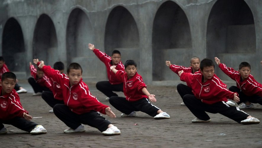Des élèves de l'école d'arts martiaux Tagou à Dengfeng en Chine, le 20 octobre 2016