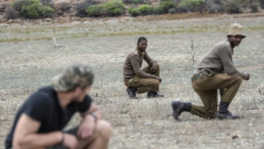 Une équipe de rangers et d'anciens militaires lors d'une opération de lutte contre le braconnage le 10 novembre 2016 dans la réserve de Kuduland à Musina en Afrique du Sud