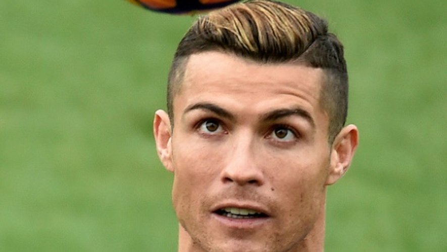 La star portugaise du Real Madrid, Ronaldo, ici à l'entraînement le 9 décembre 2016, vise un quatrième Ballon d'or