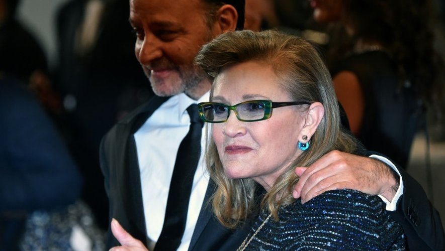 L'actrice américaine Carrie Fisher et le réalisateur Fisher Stevens le 14 mai 2016 à Cannes