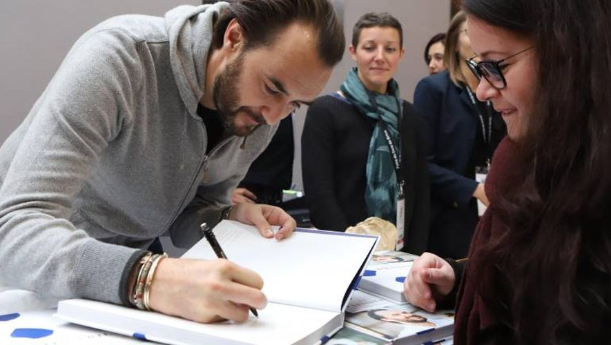 Cyril Lignac en signature ce week-end au Salon du livre de Brive. (AFP)